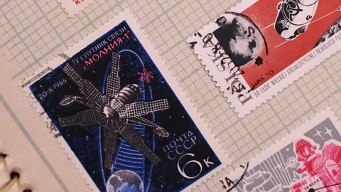 Camera  moves along the collection album with stamps, close up, macro 動画素材 126759357