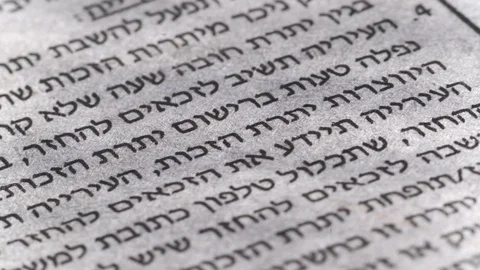 Camera moves along the Hebrew newspaper text, close up, macro view, slider movin Stock Footage 126758631