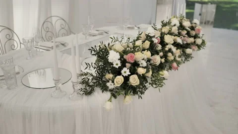 The camera moves along the main table of the newlyweds Stock Footage 208640184