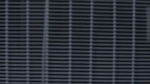 Camera Moves up along Modern Finished Fridge Vent Back Stock Footage 73995223