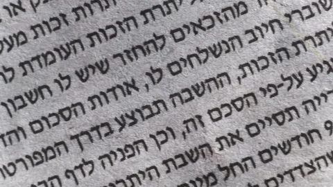 Camera moves along the newspaper, Hebrew text, close up, macro Video stock 126758864