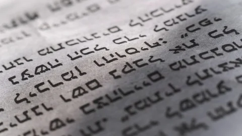 Camera moves along the newspaper, Hebrew text, close up, macro Stock Footage 126758899