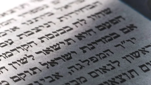 Camera moves along the newspaper, Hebrew text, close up, macro Video stock 126758948