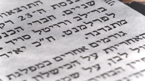 Camera moves along the newspaper, Hebrew text, close up, macro Video stock 126758950