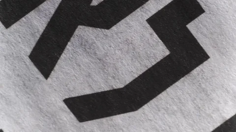 Camera moves along a newspaper sheet in Hebrew, macro view, slider moving Stock-Footage 126758756