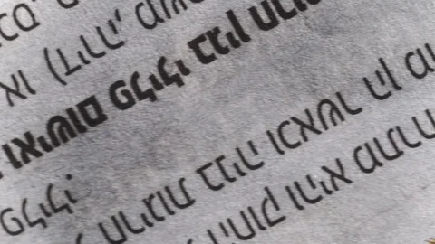 Camera moves along a newspaper sheet in Hebrew, macro view, slider moving 動画素材 126758770