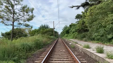 Camera moves along an old abandoned railway. Railroad station Stock Footage 271168869