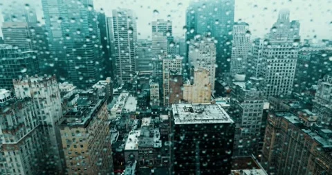 Camera Moves Along Skyscraper Window in Rainy Urban Cityscape Stock-Footage 323147058