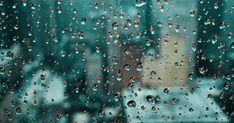 Camera Moves Along Skyscraper Window During Rain in Modern City Video stock 323147360