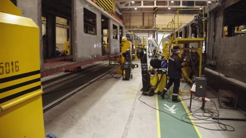 Camera moves along the subway car manufacturing workshop. working process at Stock Footage 202049136