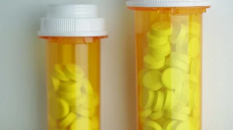 Camera moves up and stops on the bottles of pills Video stock 62184280