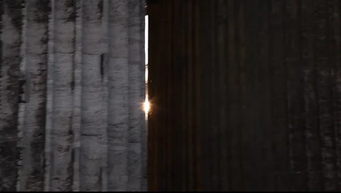 Camera moves and we see the star light in the gap between the columns Stock-Footage 6363023