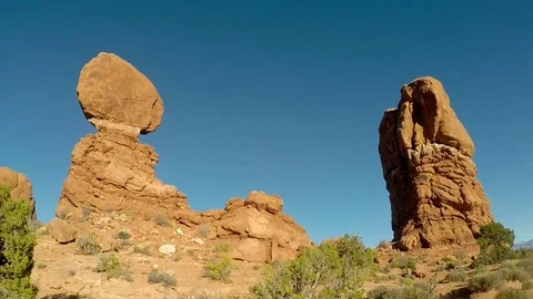 Camera moves around the Balanced Rock in Arches NP Stock Footage 79576965