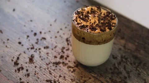 Camera moves around Dalgona Coffee gimble shot 스톡 동영상 130400205