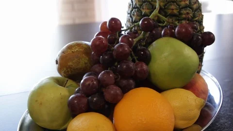 The camera moves around the fruit plate. Stock Footage 112538287