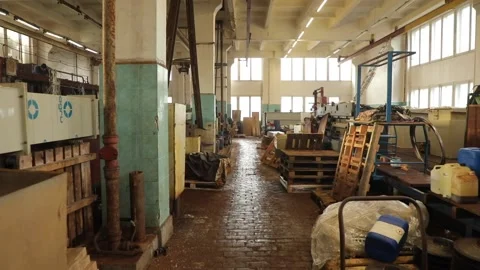 The camera moves around the workshop of the old factory Stock Footage 233071661
