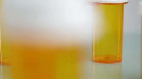 Camera moves from bottles with medicine. macro shot with slider. Stock Footage 62184466