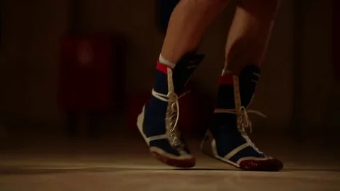 The camera moves on a crane from the bottom up. Showing the details of jumping Stock Footage 83931311