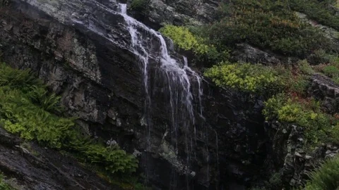 Camera moves down Waterfall vertical panorama Stock-Footage 85391862