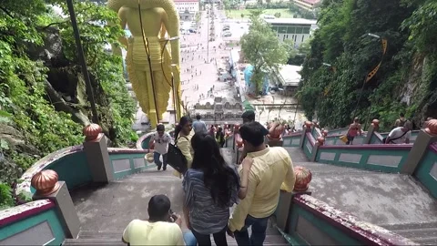 Camera moves downstairs from Main Temple cave, Batu caves, Kuala Lumpur 動画素材 197375710