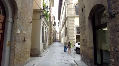Camera moves forward down Borgo Santi Apostoli Stock Footage 313257514