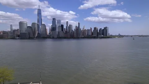Camera moves forward through the buildings and shows view of and New York City Stock Footage 240688985