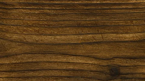 Camera moves from left to right along a dark wooden board. Stock Footage 154041848