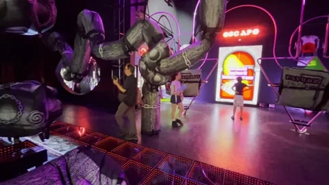 Camera moves from left to right through an immersive installation space inside Stock Footage 340148471