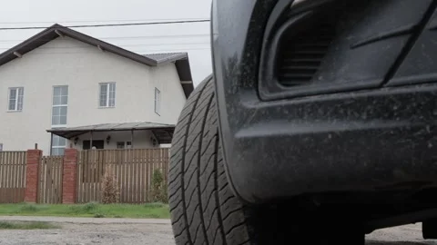 The camera moves out from under the car Stock Footage 274895482