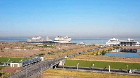 The Camera Moves Over A Modern Highway Against The Skyscraper Stock Footage 117363529
