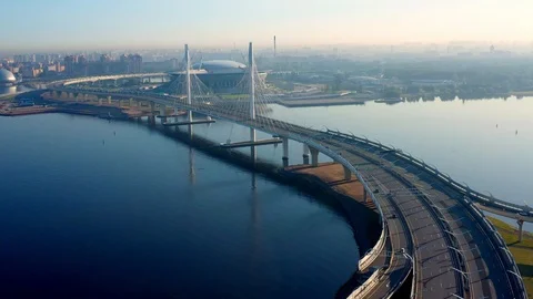 The Camera Moves Over A Modern Highway Against The Skyscraper Stock Footage 117363759