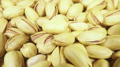 The camera moves over the pistachios Stock Footage 95395233