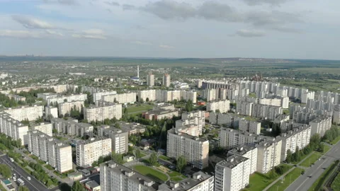 The camera moves over a small city. Developed infrastructure. Video stock 116042899