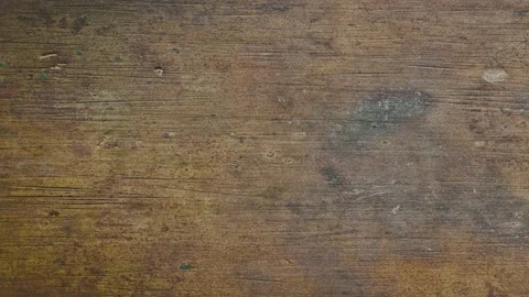 The camera moves to the right along the rusty textured surface of the metal shee Video stock 162103019