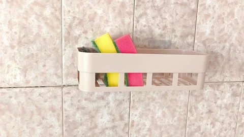 The camera moves sideways and shoots sponges in a plastic container, towels on Stock Footage 315154343