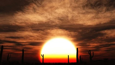 The camera moves slowly toward the setting sun Stock Footage 72109189