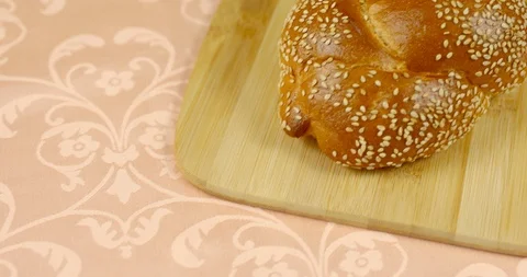 The camera moves smoothly to the challah for Shabbat Stock Footage 117202684
