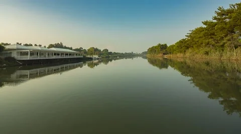 Camera moves smoothly over the river in a fantastic light Stock Footage 59726518