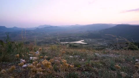 The camera moves through the grass, view of the wonderful landscape Stock Footage 160954663