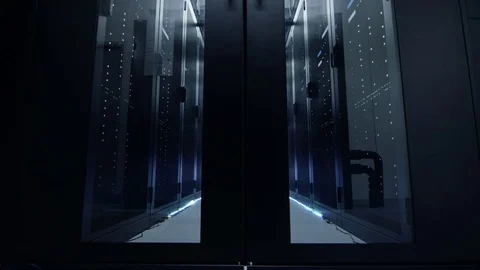 Camera Moves Through Opening Doors Into Data Center.  Stockbeeldmateriaal 74620614