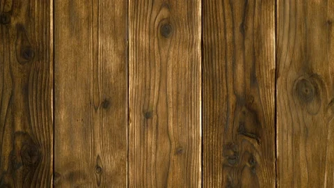 Camera moves from top to bottom along a dark wooden boards. Stock Footage 153895771