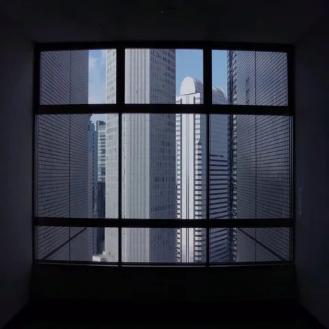Camera moves toward skyscrapers through window Stock Footage 69552344