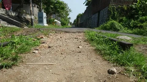 The camera moves, walks past the railroad tracks that are no longer active Stock Footage 146448448