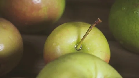 The camera moves on wet apples slow motion Stock Footage 88097290