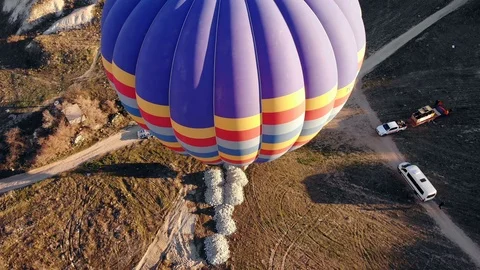 Camera moving above and around huge air baloon Stock Footage 107189690