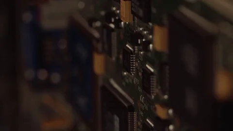 Camera moving above electronic circuits Stock Footage 76871070