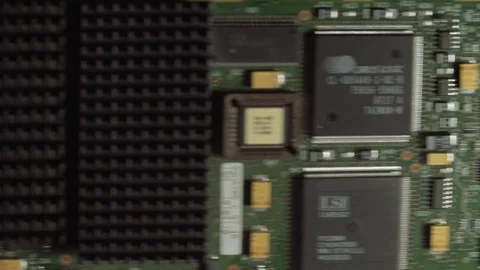 Camera moving above electronic circuits Stock Footage 76872392
