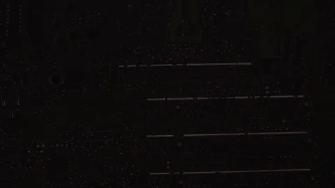 Camera moving above electronic circuits Stock Footage 76873034