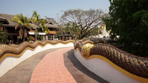 Camera moving along the beautiful dragon bridge in the Buddhist temple. Asian Stock Footage 88299073