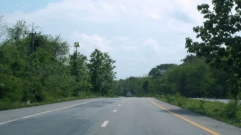 Camera moving along the green nature road Video stock 109083741